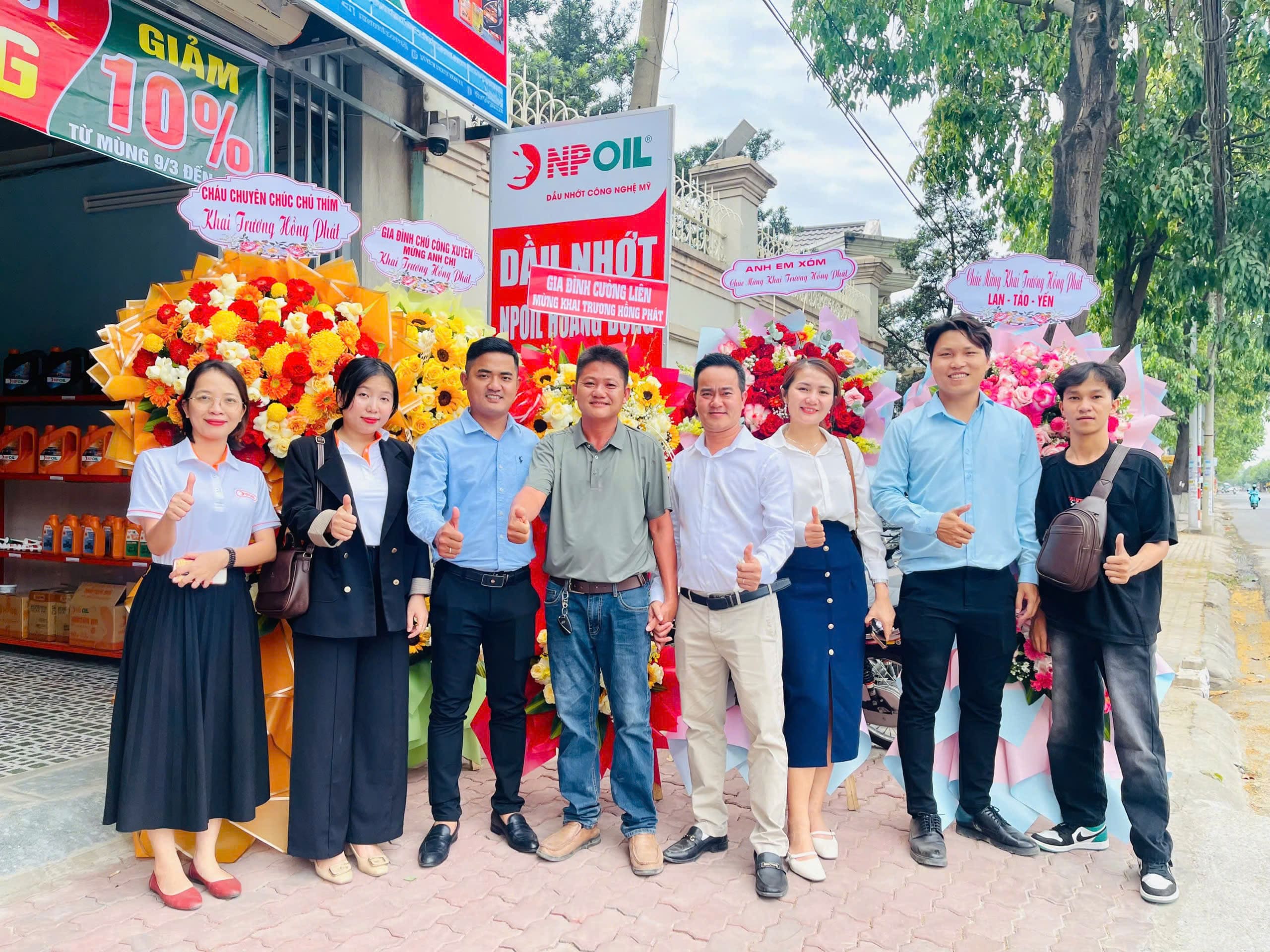 khai trương dầu nhớt npoil hoàng dựng